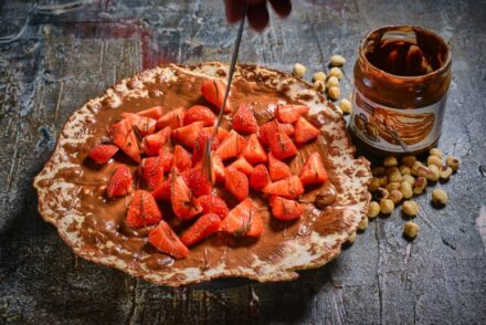 dessert pizza with chocolate and strawberries